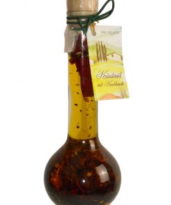 Kräuteröl mit Knoblauch in der bauchigen Flasche